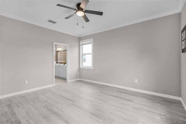 unfurnished bedroom featuring ceiling fan, ensuite bathroom, crown molding, and light hardwood / wood-style floors