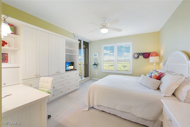 bedroom with light colored carpet and ceiling fan