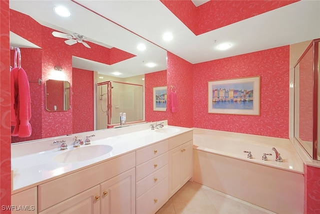 bathroom featuring plus walk in shower, tile patterned floors, ceiling fan, and vanity