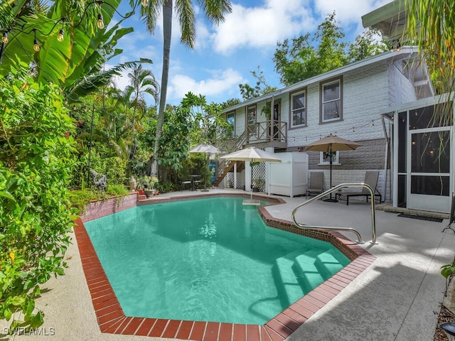 view of pool with a patio area