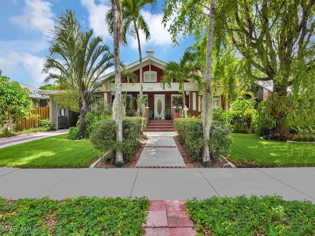 view of front facade with a front yard