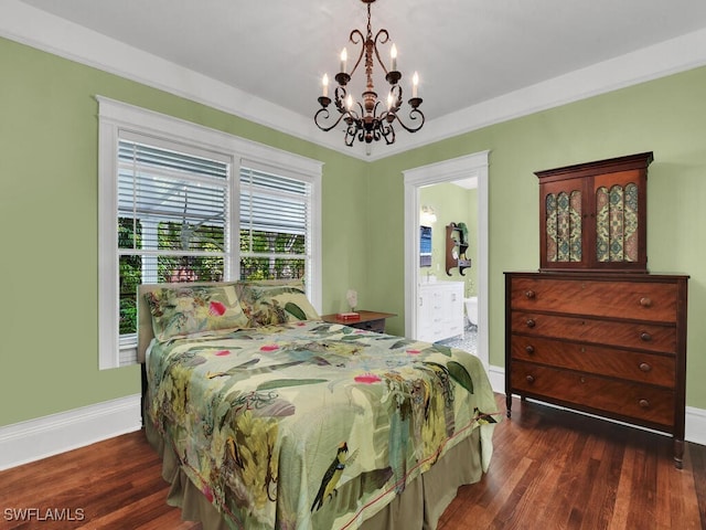 bedroom featuring connected bathroom, dark wood-type flooring, and ornamental molding