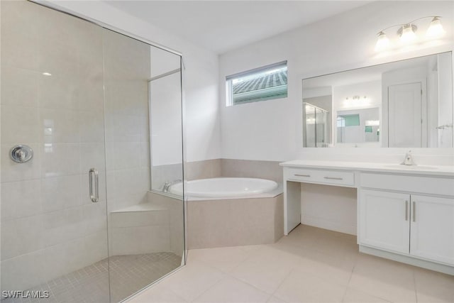 bathroom featuring vanity, tile patterned flooring, and plus walk in shower