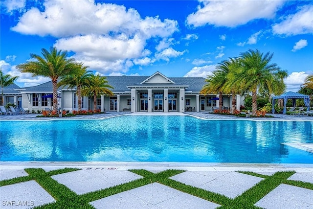 view of pool featuring a gazebo, a patio, and french doors