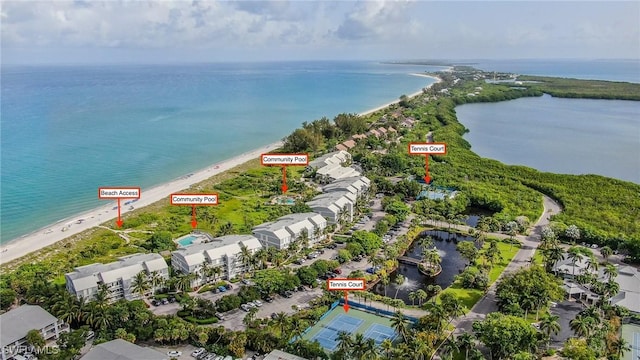 aerial view with a beach view and a water view