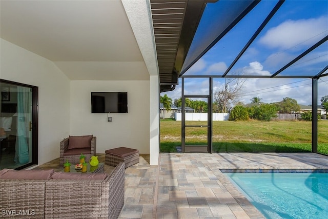 exterior space with a lanai, a fenced in pool, and outdoor lounge area