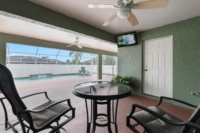 interior space featuring plenty of natural light and ceiling fan