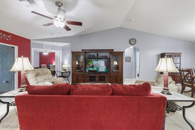 tiled living room featuring lofted ceiling and ceiling fan