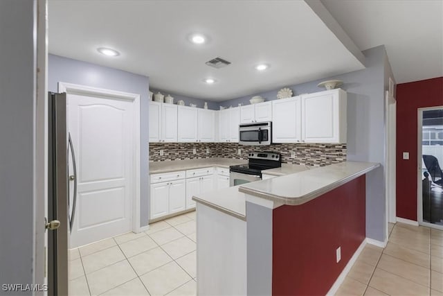 kitchen featuring white cabinetry, appliances with stainless steel finishes, backsplash, and kitchen peninsula