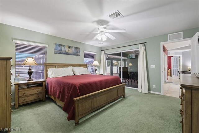 bedroom with access to exterior, carpet floors, and ceiling fan