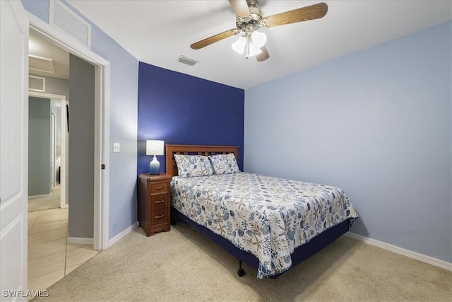 bedroom with light colored carpet and ceiling fan