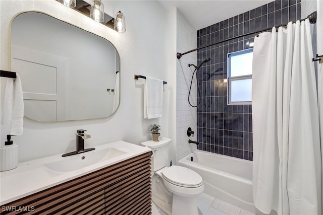 full bathroom with vanity, toilet, and shower / bath combo