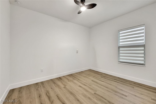 unfurnished room with ceiling fan and light hardwood / wood-style flooring