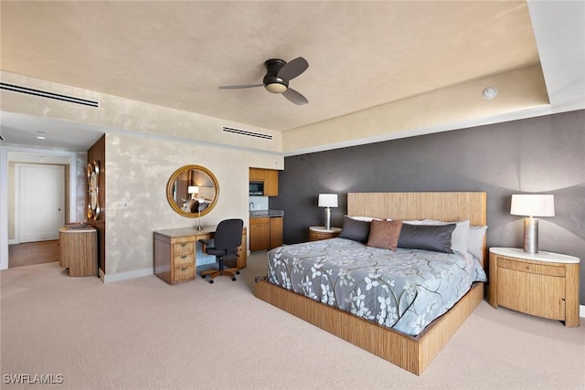 bedroom featuring light colored carpet