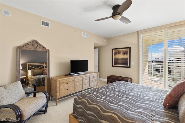 carpeted bedroom with access to outside and ceiling fan