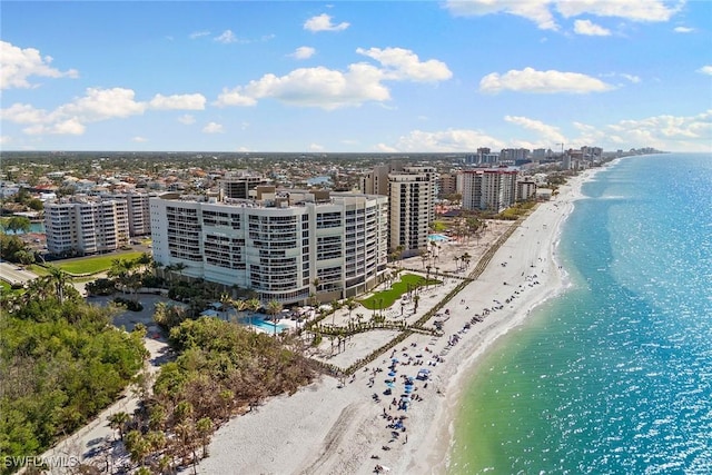 aerial view with a beach view and a water view