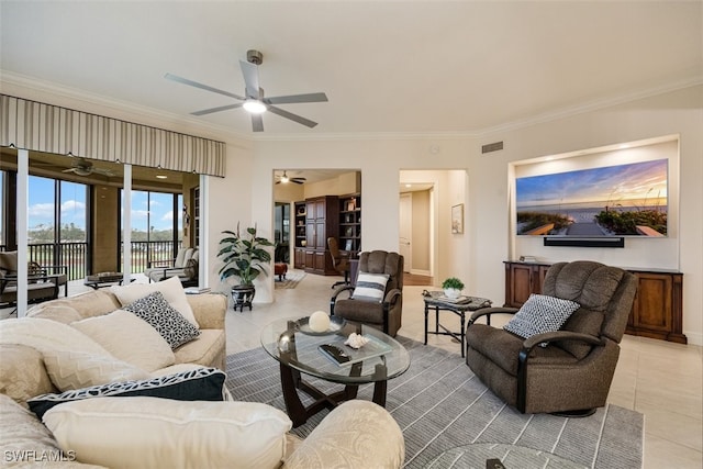 tiled living room featuring ceiling fan and ornamental molding