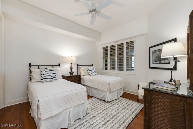 bedroom featuring dark hardwood / wood-style floors and ceiling fan