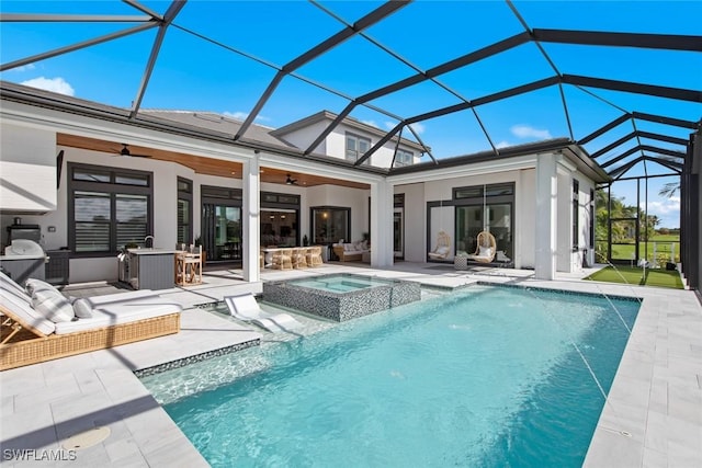 back of property featuring outdoor dry bar, a patio, an outdoor living space, and stucco siding