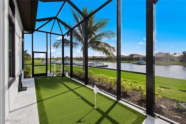 unfurnished sunroom with a water view