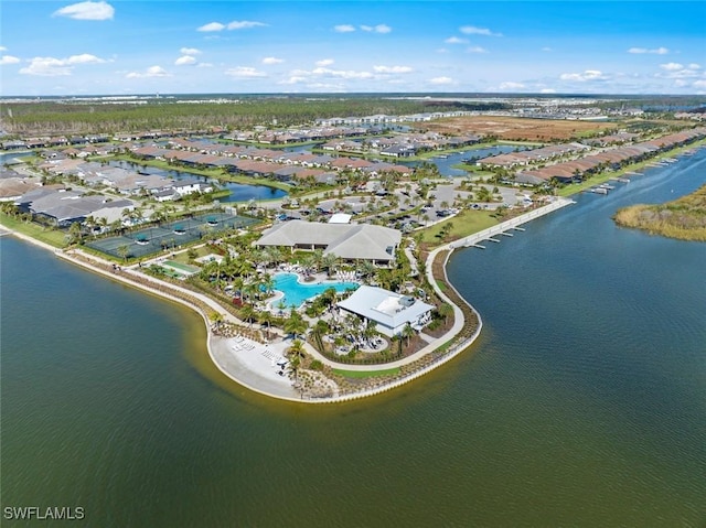 drone / aerial view with a water view