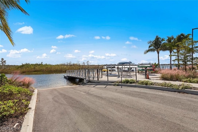 dock area featuring a water view