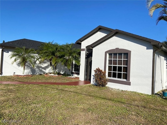 exterior space with a front yard