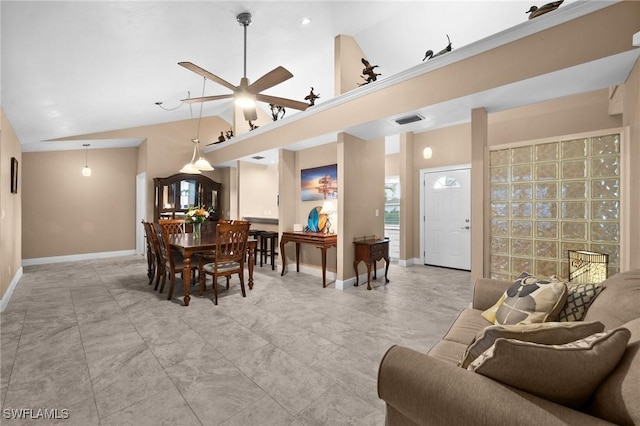 living room featuring ceiling fan and high vaulted ceiling