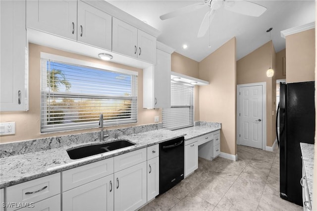 kitchen with white cabinetry, lofted ceiling, sink, and black appliances