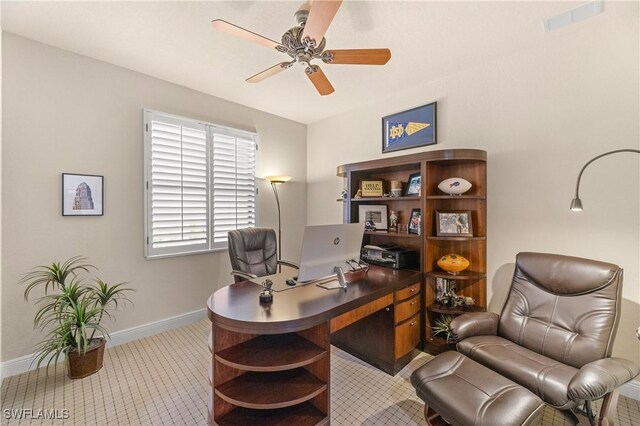 office space with ceiling fan