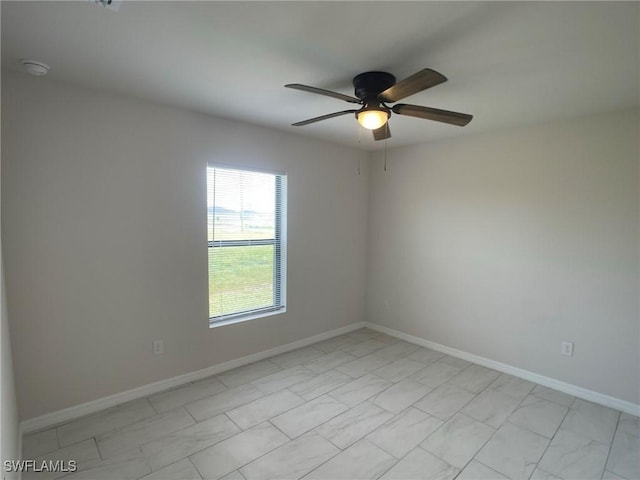 empty room featuring ceiling fan