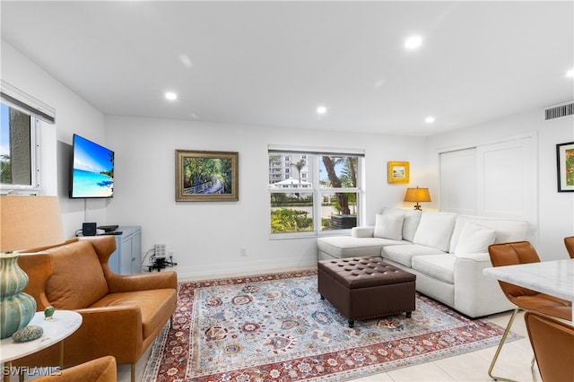 living room featuring light tile patterned floors