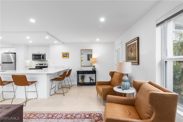 living room featuring light tile patterned floors