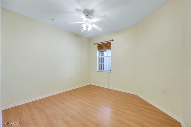 unfurnished room with light hardwood / wood-style flooring and ceiling fan