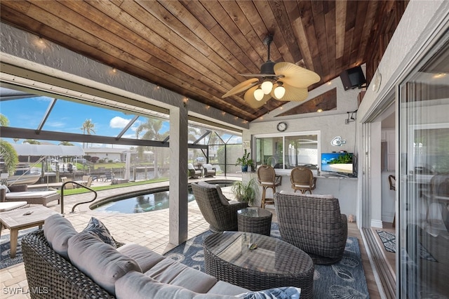 sunroom / solarium with vaulted ceiling and wooden ceiling