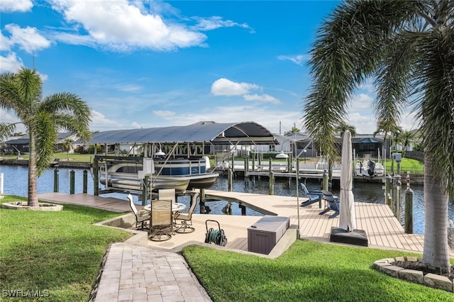 dock area featuring a residential view, a water view, a yard, and boat lift