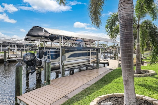 view of dock featuring a water view and boat lift