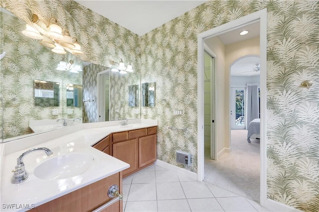 bathroom featuring vanity, ceiling fan, and tile patterned flooring