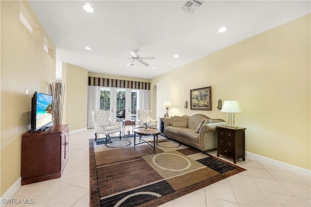 tiled living room with ceiling fan