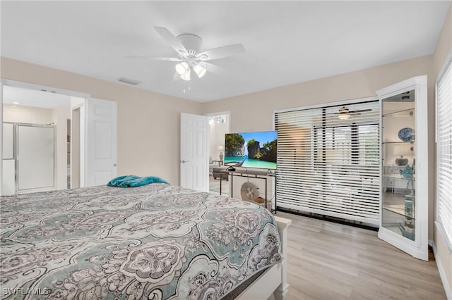 833 Reef Point Cir, Naples, FL 34108 - bedroom with light wood-type flooring and ceiling fan