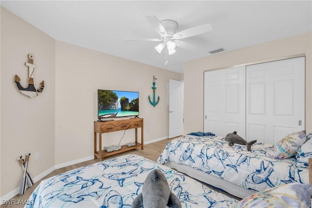 833 Reef Point Cir, Naples, FL 34108 - bedroom featuring a closet and ceiling fan