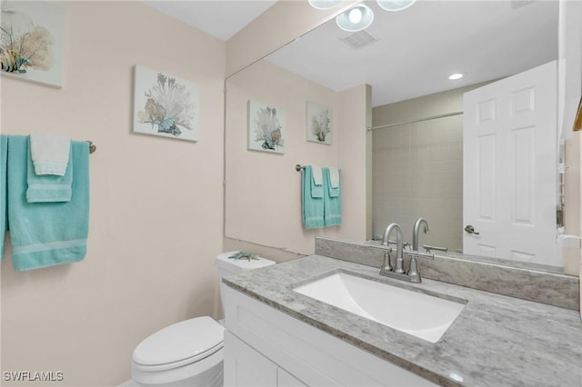 833 Reef Point Cir, Naples, FL 34108 - bathroom featuring toilet and vanity