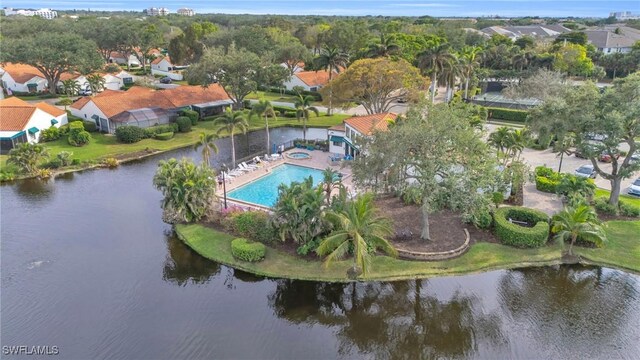 833 Reef Point Cir, Naples, FL 34108 - birds eye view of property featuring a water view