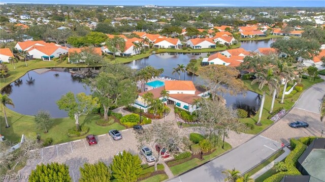 833 Reef Point Cir, Naples, FL 34108 - drone / aerial view with a water view