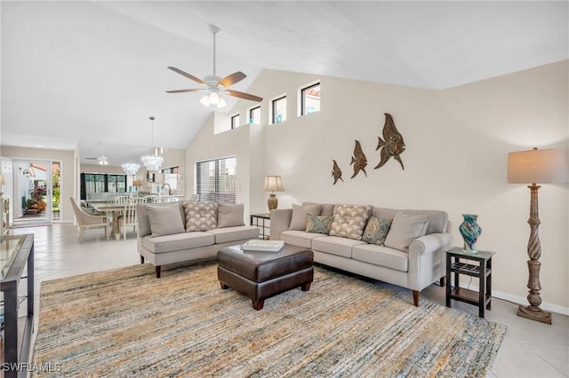 833 Reef Point Cir, Naples, FL 34108 - tiled living room featuring ceiling fan and high vaulted ceiling