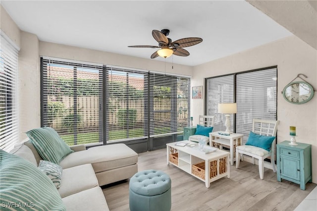833 Reef Point Cir, Naples, FL 34108 - living room with ceiling fan and light wood-type flooring