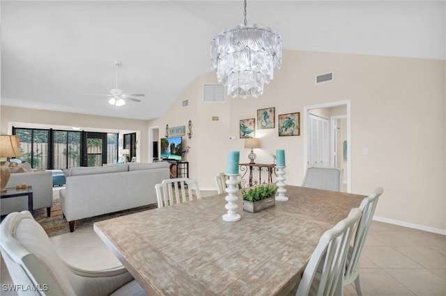 833 Reef Point Cir, Naples, FL 34108 - dining room featuring high vaulted ceiling, ceiling fan with notable chandelier, and light tile patterned floors