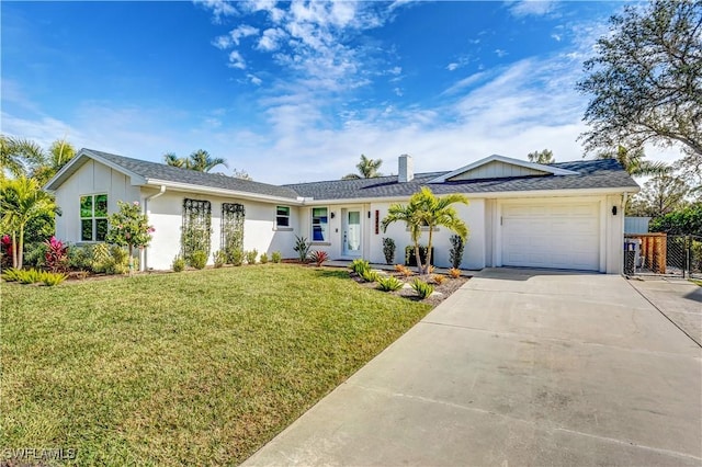 ranch-style house with a garage and a front yard