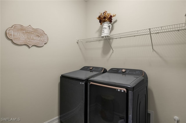 laundry area with washer and dryer