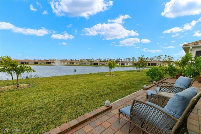 view of yard with a water view